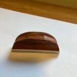 Slide with a wooden handle